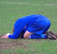 Soccer player on ground
